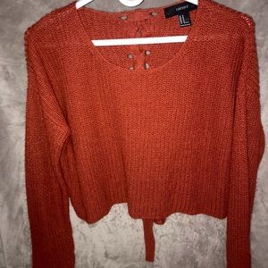 burnt orange-ish sweater